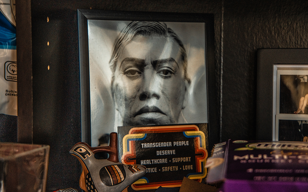 TransLatin@ Coalition President and CEO Bamby Salcedo has a portrait of herself on a bookshelf in her office in Los Angeles, California, Tuesday, July 5, 2022. (Photo by Jessica Alvarado Gamez/News21)